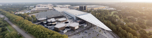 Aerial view of the Düsseldorf exhibition centre, showing the exhibition halls and the adjacent Nordpark. Copyright: Messe Düsseldorf
